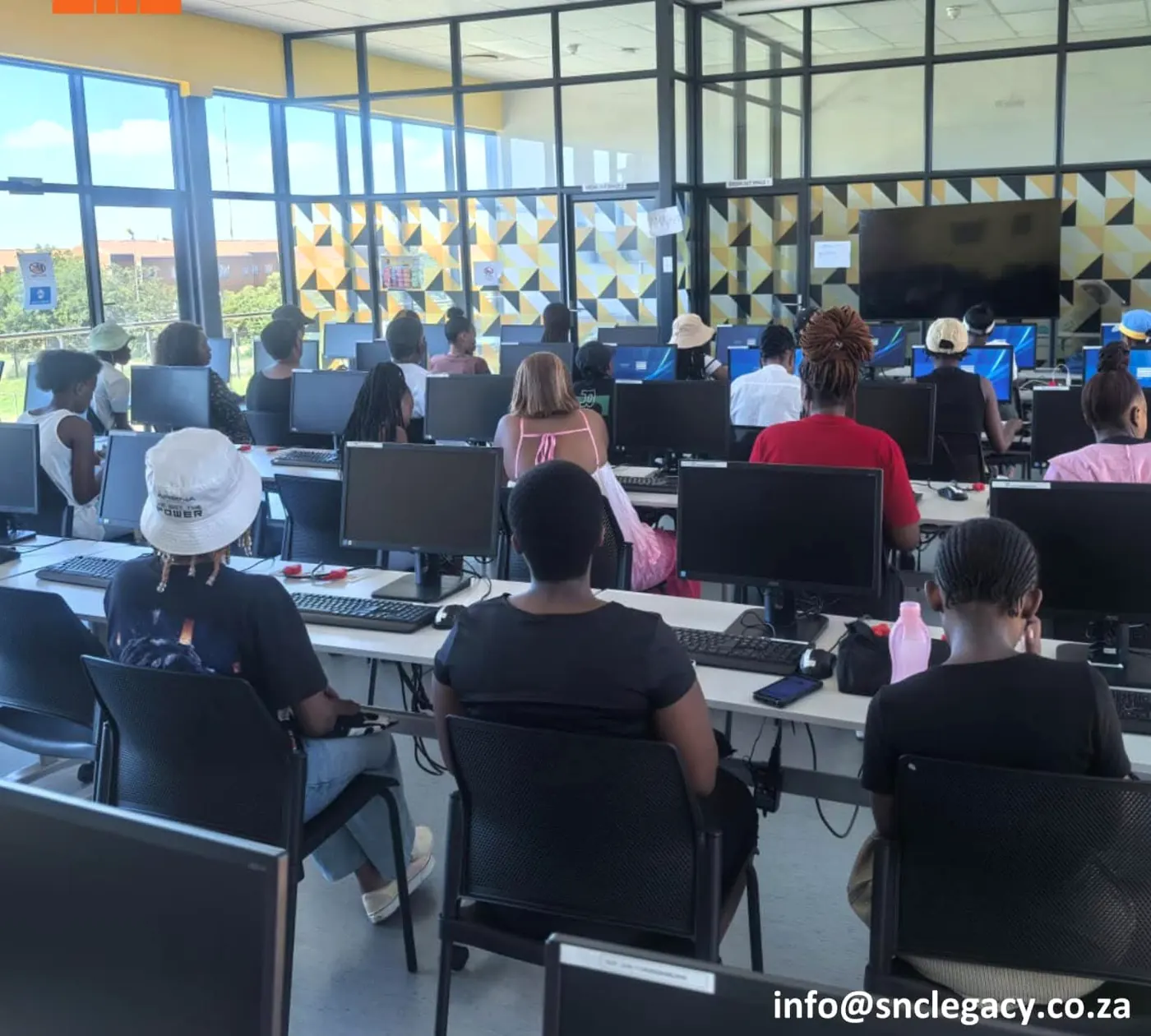 Young people training in a modern computer lab