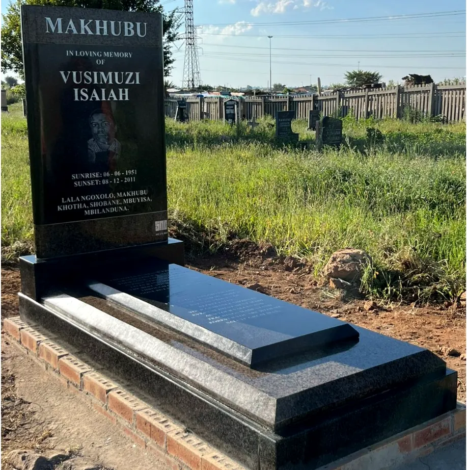 Black granite headstone and grave cover installed by SNC